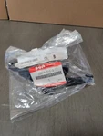 Suzuki Oem Reflex Reflector Bracket 35974-21G10 LT-Z250 Quadsport. Fixed Price $18.00.