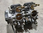 Cleaned!! 2002 Kawasaki Prairie 650 Carburetor 15003-1557. Fixed Price $335.00.